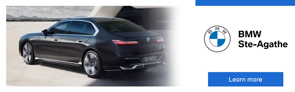 BMW Ste-Agathe ad showing a rear view of a BMW 7 Series sedan on a desert-like road.