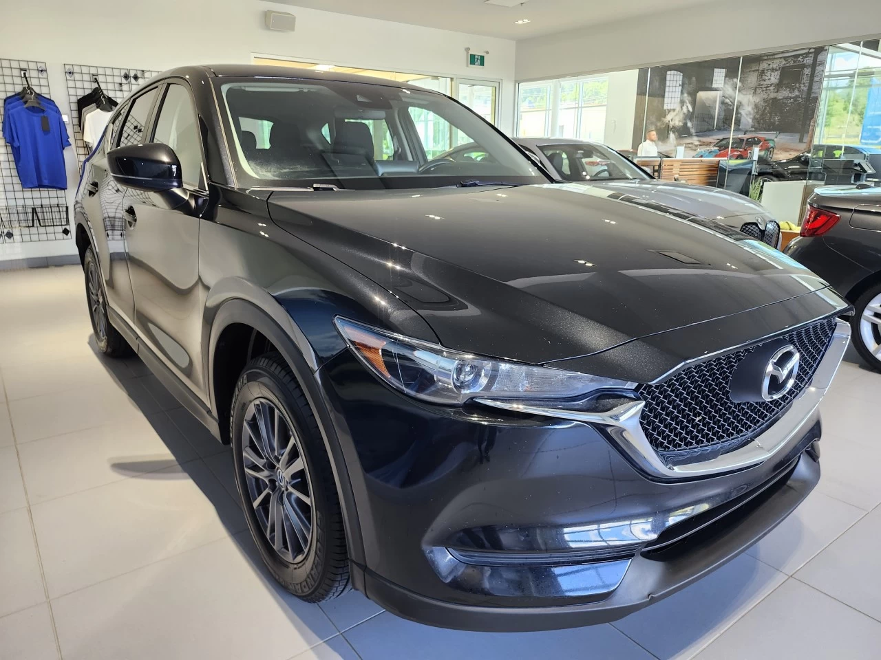 2021 Mazda CX-5 GX https://www.bmwsteagathe.com/resize/b990ff35b810a3abc0cc817b2ca24889-1