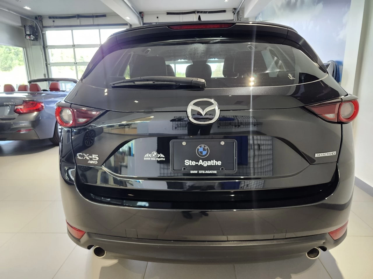 2021 Mazda CX-5 GX https://www.bmwsteagathe.com/resize/b990ff35b810a3abc0cc817b2ca24889-1